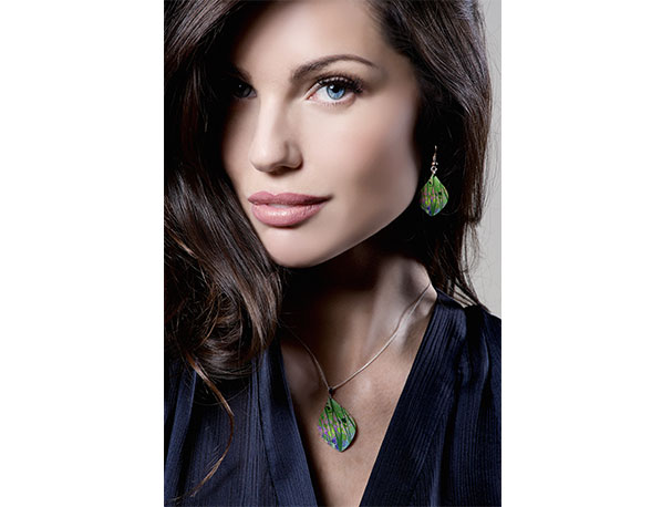 Pixalum Model wearing Honesty Green pendant